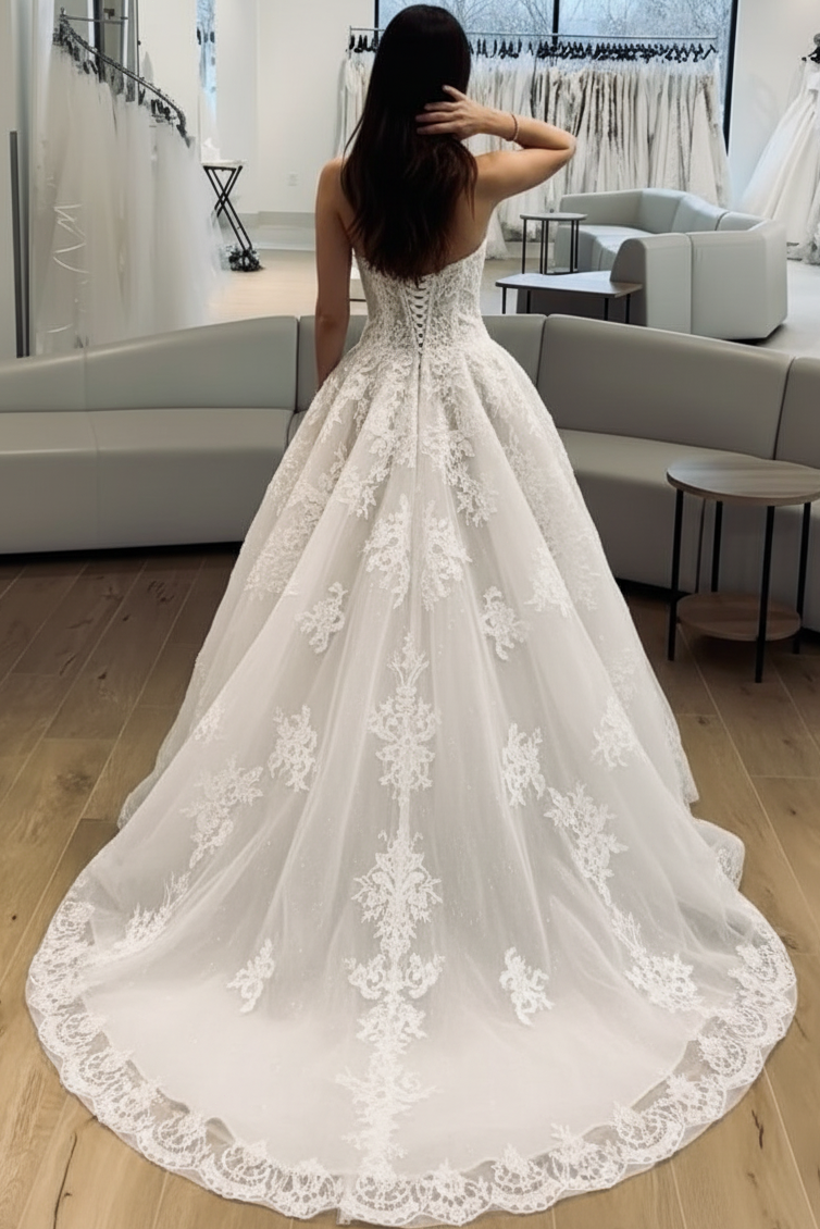 Sweetheart Sleeveless Allover Lace Applique Tulle Pleated A-Line Wedding Dress with Train