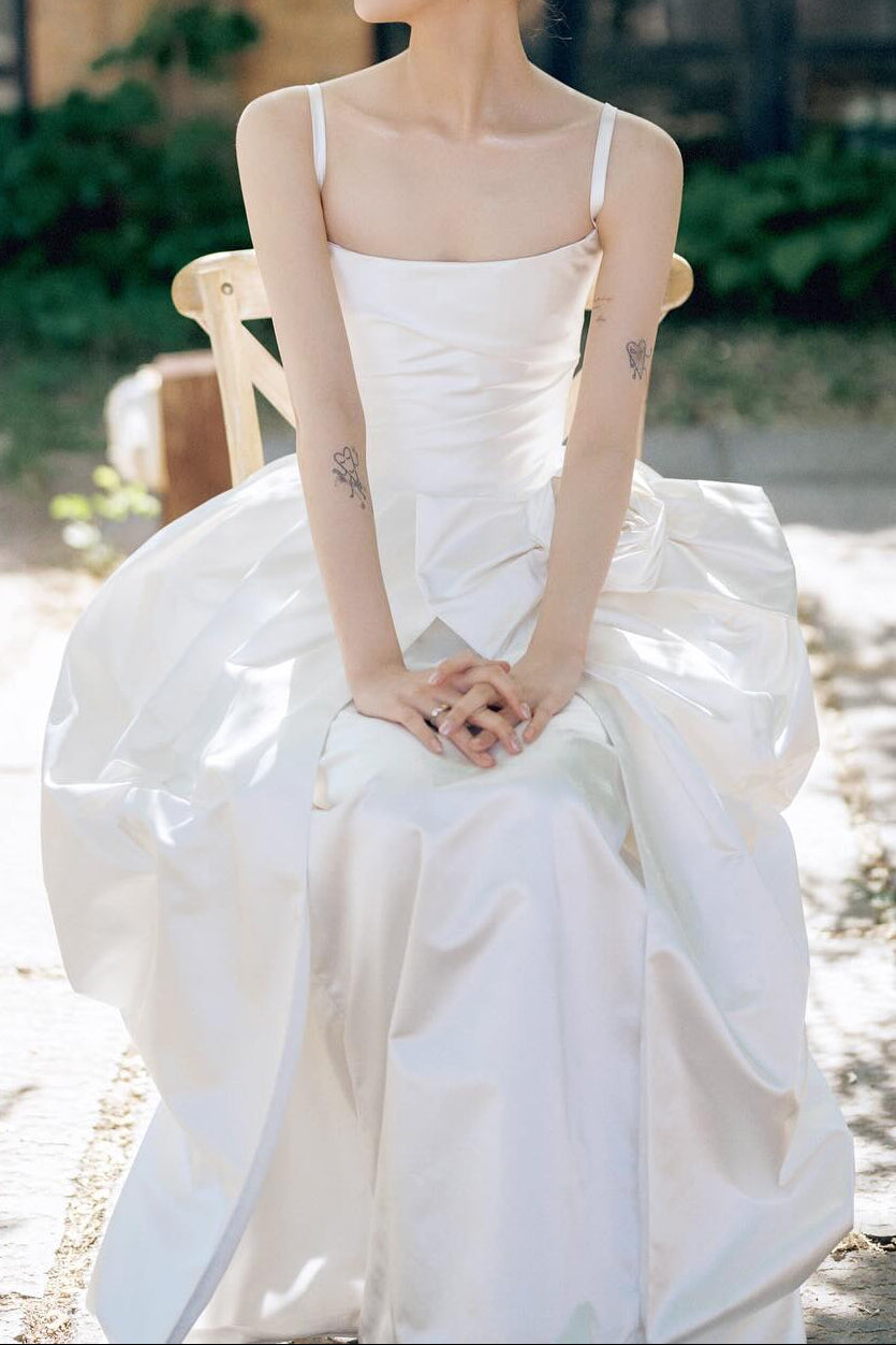 Satin Wedding Dress with Draped Skirt and Bow Detail