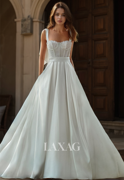 A-Line Straps Sweetheart Satin Bride Dress Beaded Pleated Sleeveless Wedding Dress with Bows