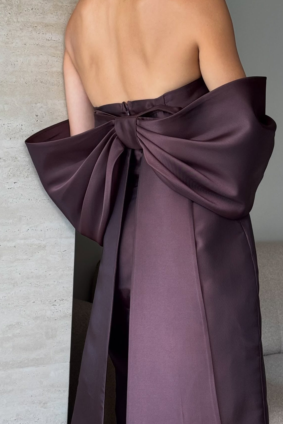 Strapless Pleated Satin Column Gown with Statement Bow