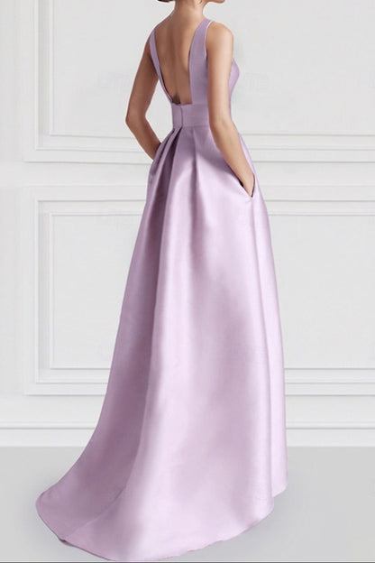 High-Low Satin Gown with Pockets and Waist Flower Detail