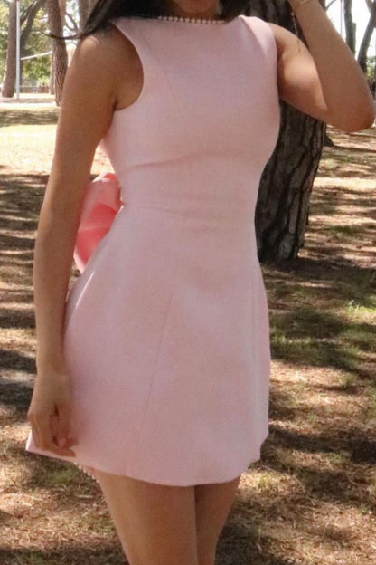 Backless Pearl-Trimmed Mini Dress with Statement Bow