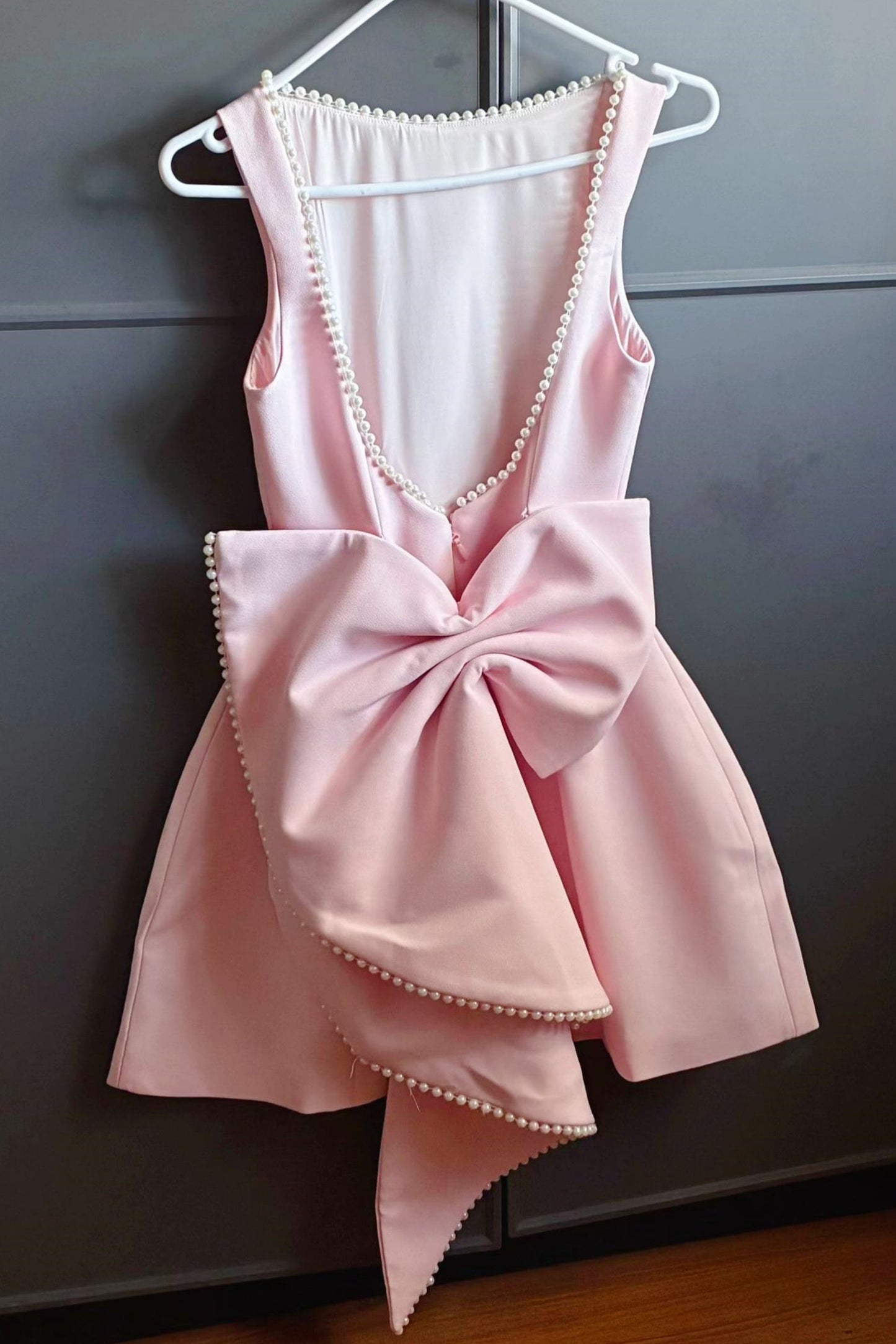 Backless Pearl-Trimmed Mini Dress with Statement Bow