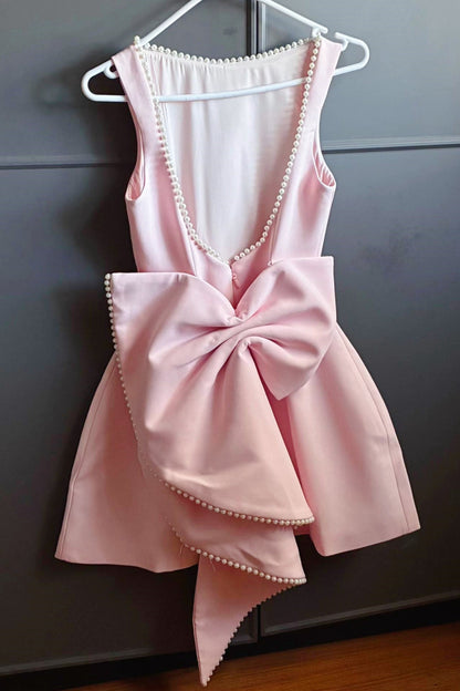 Backless Pearl-Trimmed Mini Dress with Statement Bow